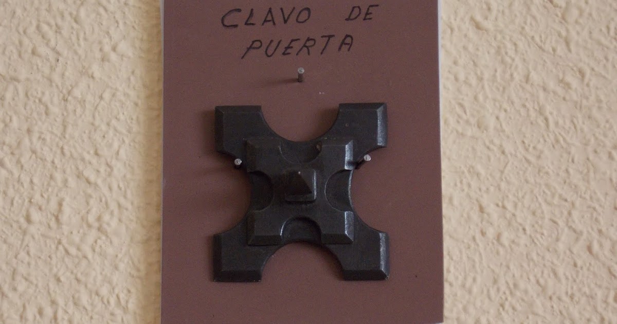 FORJA ARTÍSTICA ARTESANAL Clavo de puerta