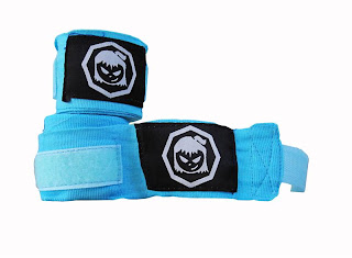 Women's boxing gloves and hand wraps