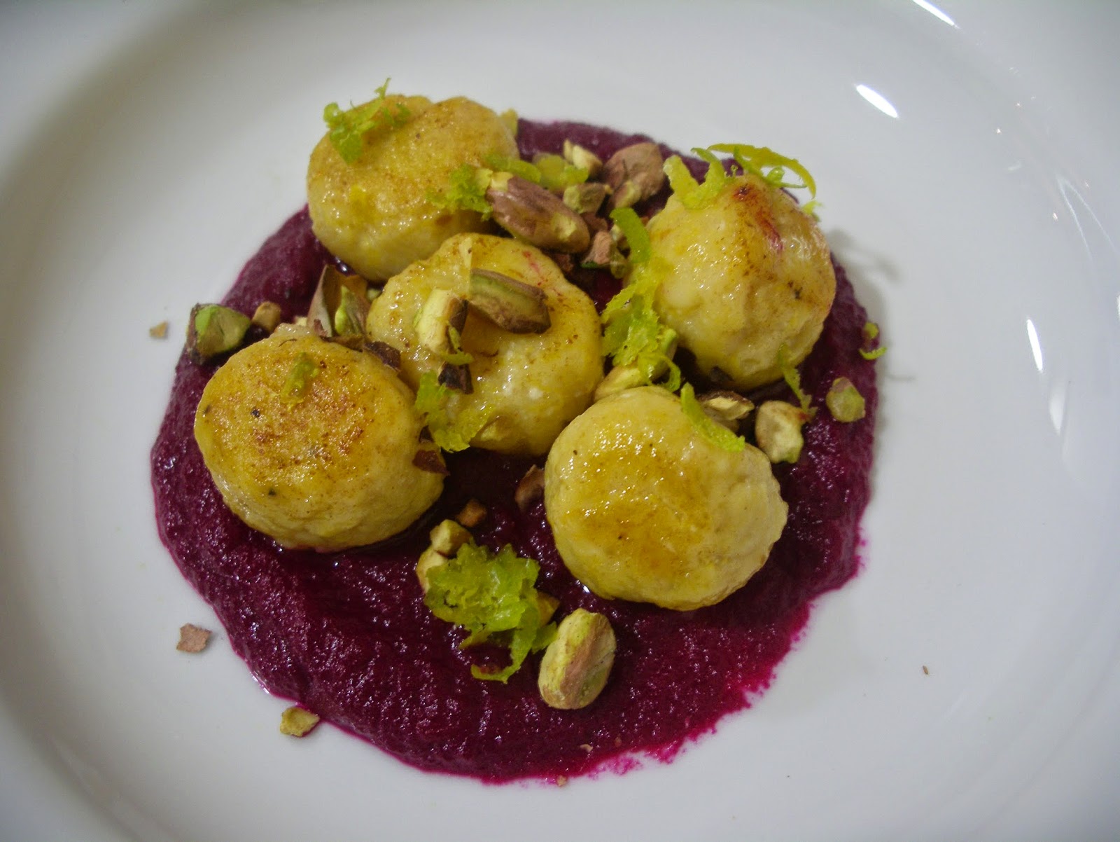 KITCHEN IN THE SAND Pumpkin ricotta gnocchi on beetroot sauce with