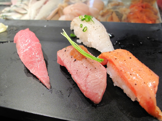 Tsukiji Fish market tokyo sushizanmai sushi zanmai ootoro fatty tuna grilled