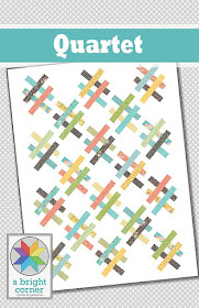 Quartet quilt pattern by Andy of A Bright Corner - a jelly roll quilt pattern with four sizes.  Perfect for using pre-cut strips.