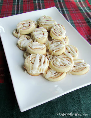 If you love cinnamon rolls and sugar cookies, you are going to love this delicious marriage of the two. They are a hit every time I make them! platter of cinnamon roll cookies