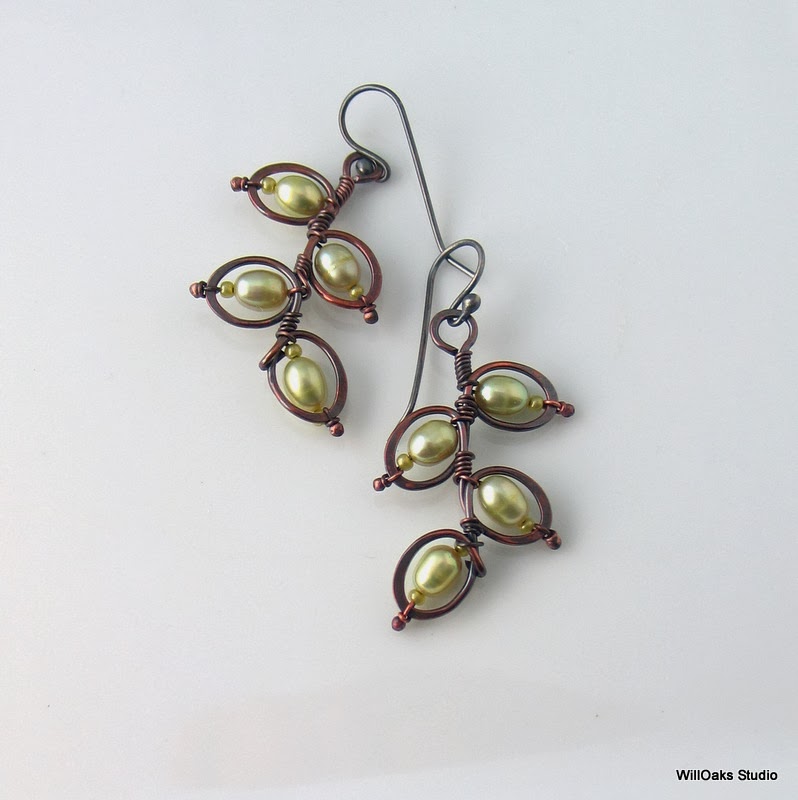 https://www.etsy.com/listing/179670551/green-pearl-earrings-metalwork-dangles?