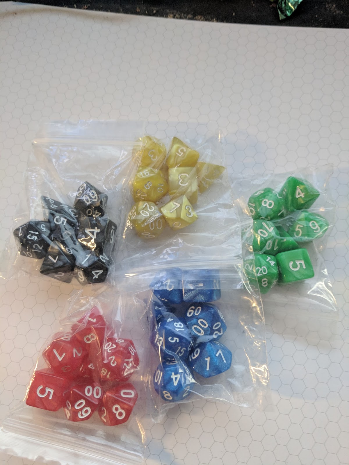 Tenkar's Tavern Dice Dice Baby Dice Bags, Dice Cup and Dice (Amazon)