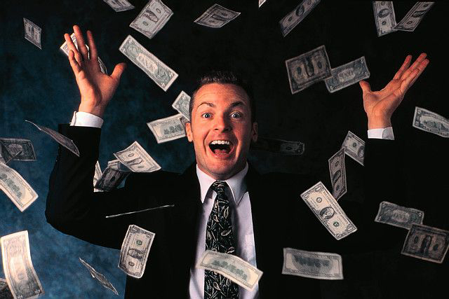 man_throwing_money.jpg