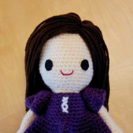 Crochet amigurumi Nami doll - yarn hair, face, head, and dress sleeves