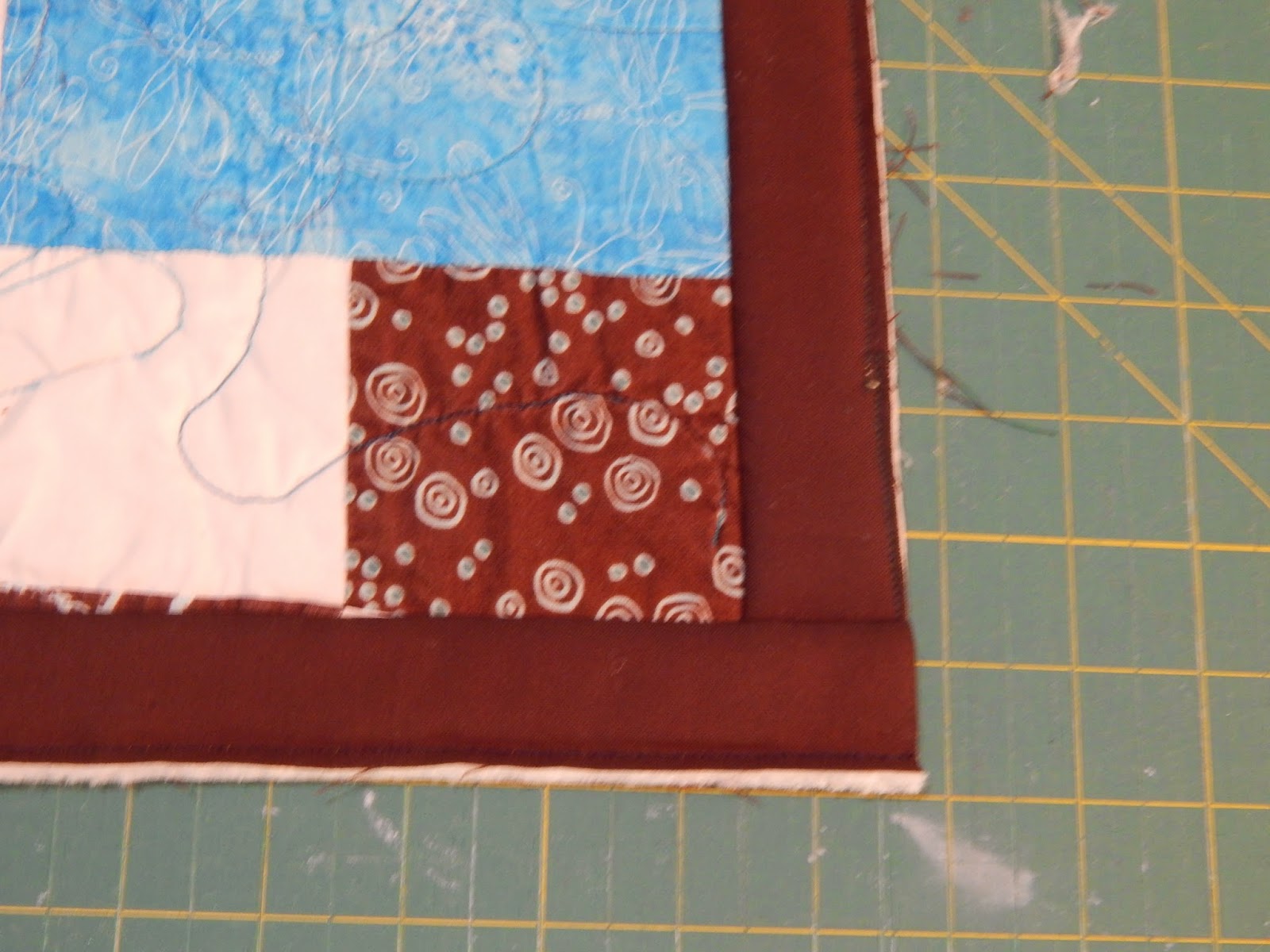 The Fleming's Nine How to Make a Finished Quilt Bigger