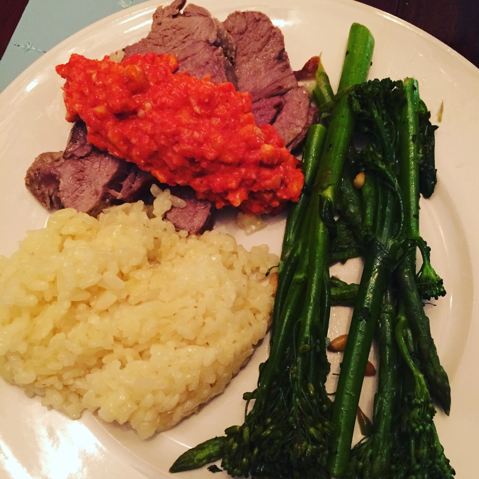 Brilliant Butterflied Lamb with Romesco Sauce and Saffron Paella