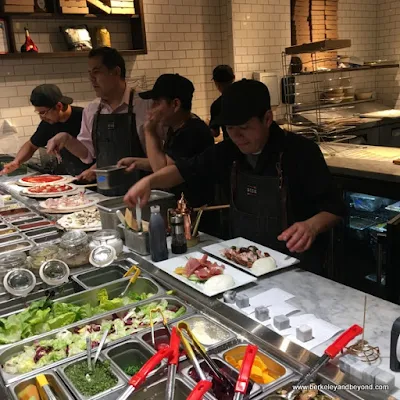 making pizzas in the open kitchen at Rise Pizzeria in Burlingame, California