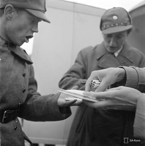 Finnish troops receiving cigaret ration, 27 August 1941 worldwartwo.filminspector.com