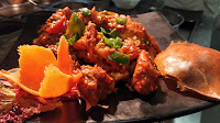 Crab in schezwan sauce in Oasis restaurant