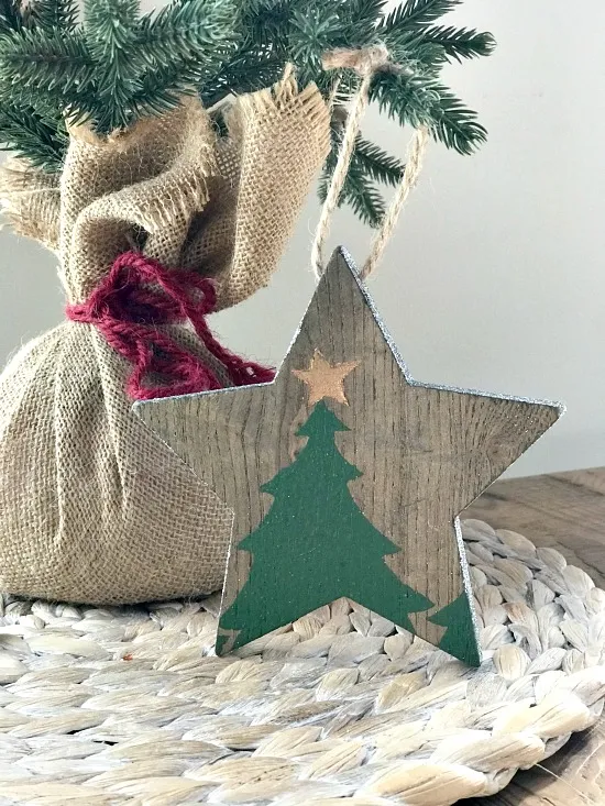 stenciled wooden star ornament with tree base