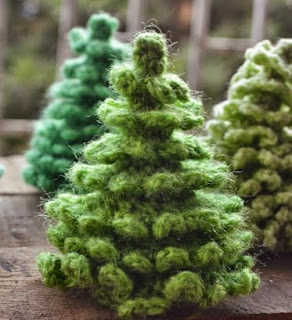 http://translate.google.es/translate?hl=es&sl=en&tl=es&u=http%3A%2F%2Fwww.thelazyhobbyhopper.blogspot.in%2F2014%2F10%2Fcrochet-christmas-tree-free-pattern.html