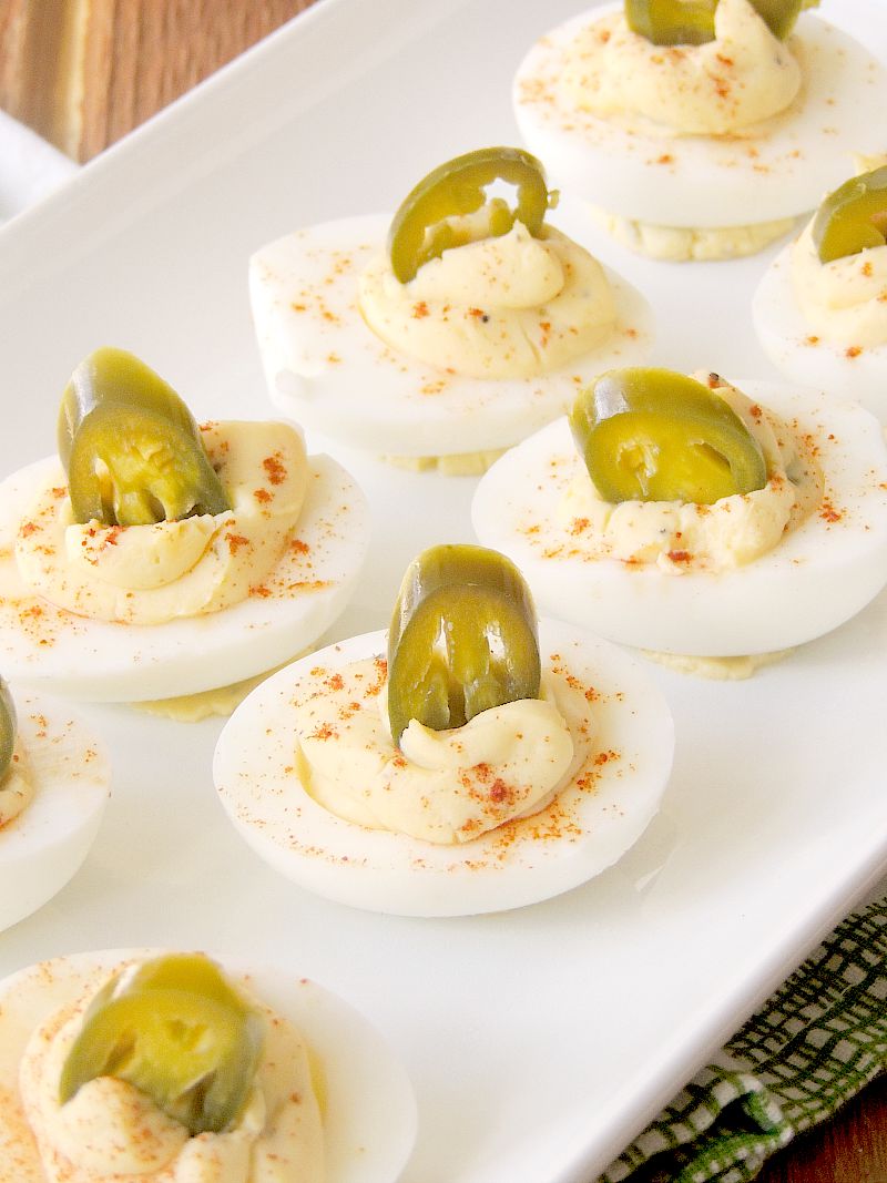 These Jalapeno Popper Deviled Eggs are the perfect Keto friendly appetizer! They are sure to please Keto and Non-Keto peeps!! #lchf #lowcarb #keto #appetizer #eggs #jalapeno #easy #recipe | bobbiskozykitchen.com