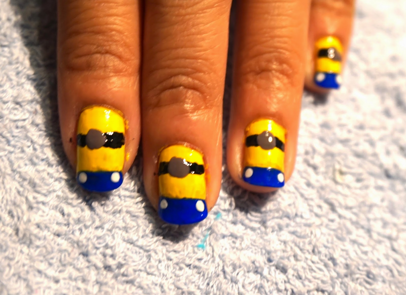 6. Minion Nail Art Step by Step - wide 11