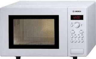 Microondas Foto de una microondas color blanco