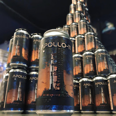 Photo of stacks of cans of Celestial Brewing's Apollo-11 Double IPA.