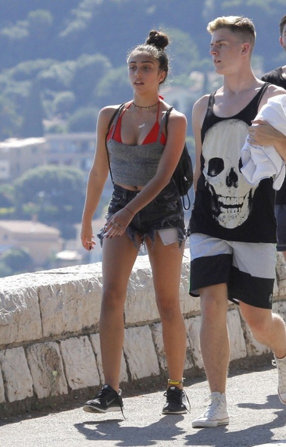 Lourdes Leon With Friends In France Lourdes Leon (Madonna Daughter) was seen taking a walk with friends in Villefranche-sur-Mer, France on Sunday (August 11). The 16-year-old wore jean shorts and a gray tank over a red bik!ni top. She recently blogged about dealing with summertime.