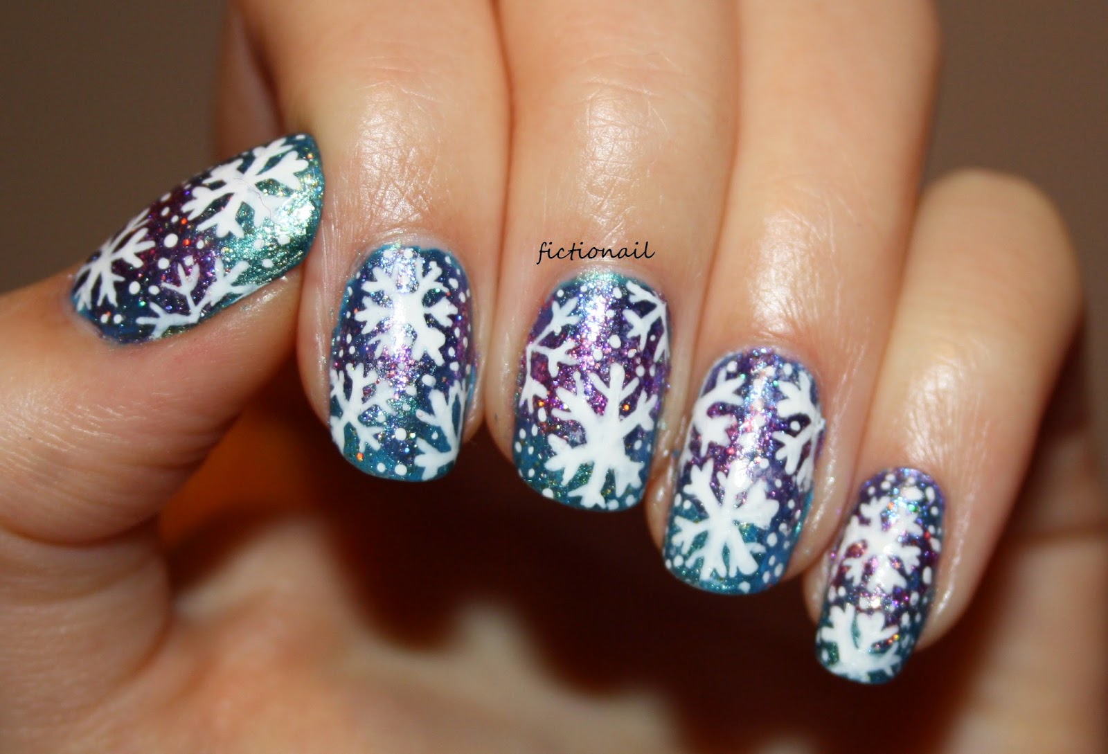 3. Frosty Blue Snowflake Nails - wide 5
