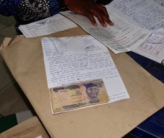 ONDObyelection1 INEC’s Staff Held Hostage, Bribed To Thumb Print Ballot Papers In Ondo By Election [See Photo]