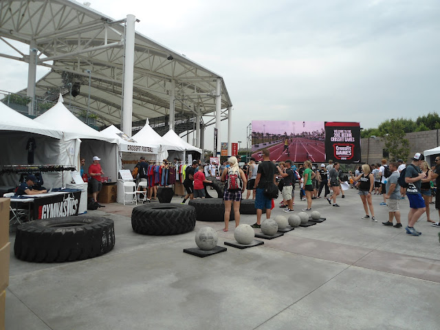 Image of tractor trailer tires and atlas stones in a row at the 2012 CrossFit Games