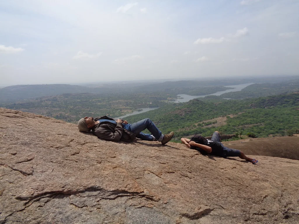 Savandurga Trek in Fog: The Loapers riding through dense morning fog on the way to the mountain.