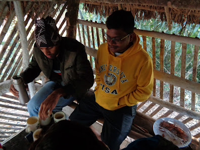 Schoold friends pour tea for one another as we prepare for the big trek