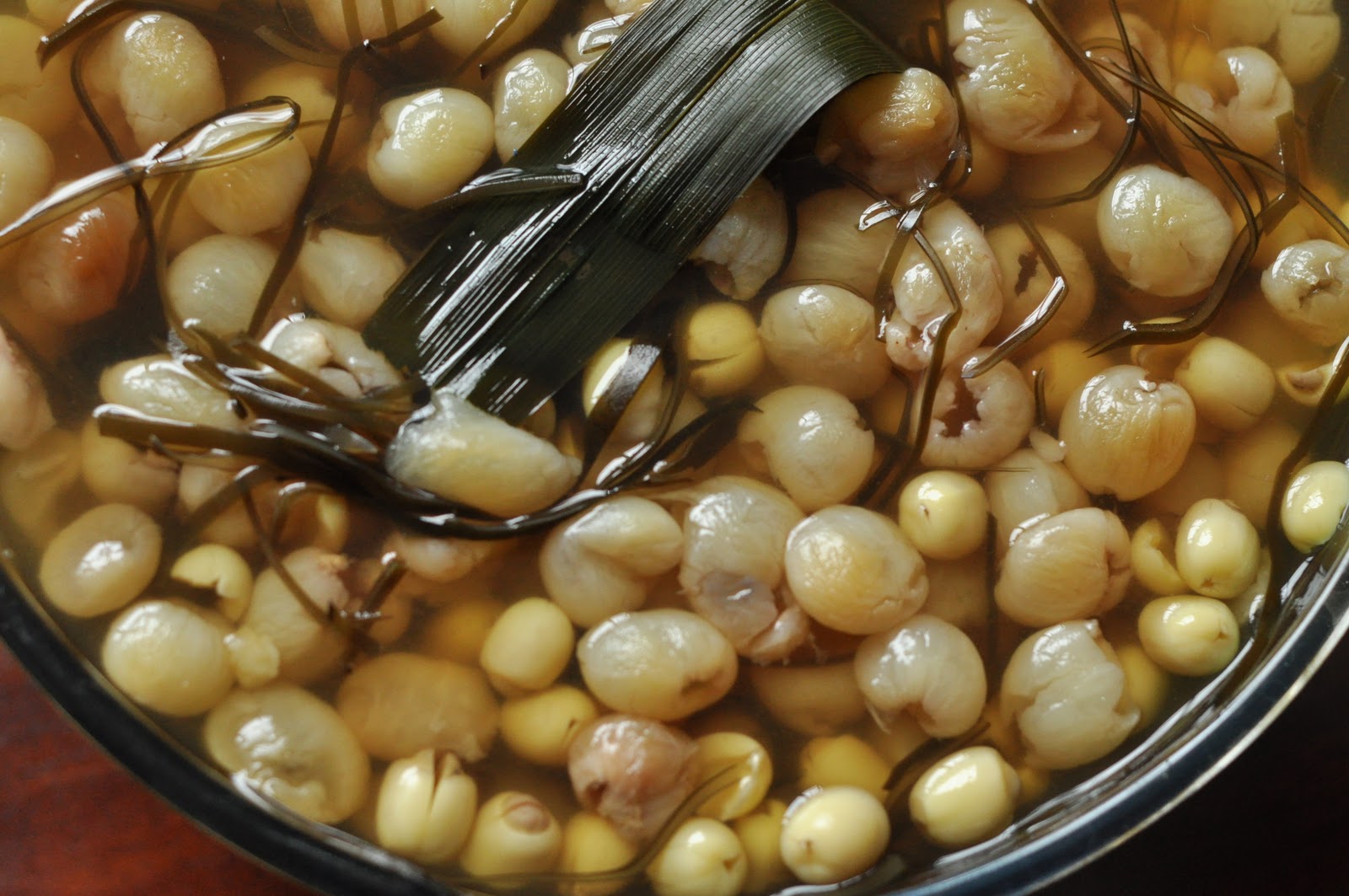 Vietnamese Dessert Recipe: Re-Hydrated Logans, Lotus Seed, \u0026 Wakame Seaweed  In Pandan Infusion — Uyen Luu, image size:1600x1063