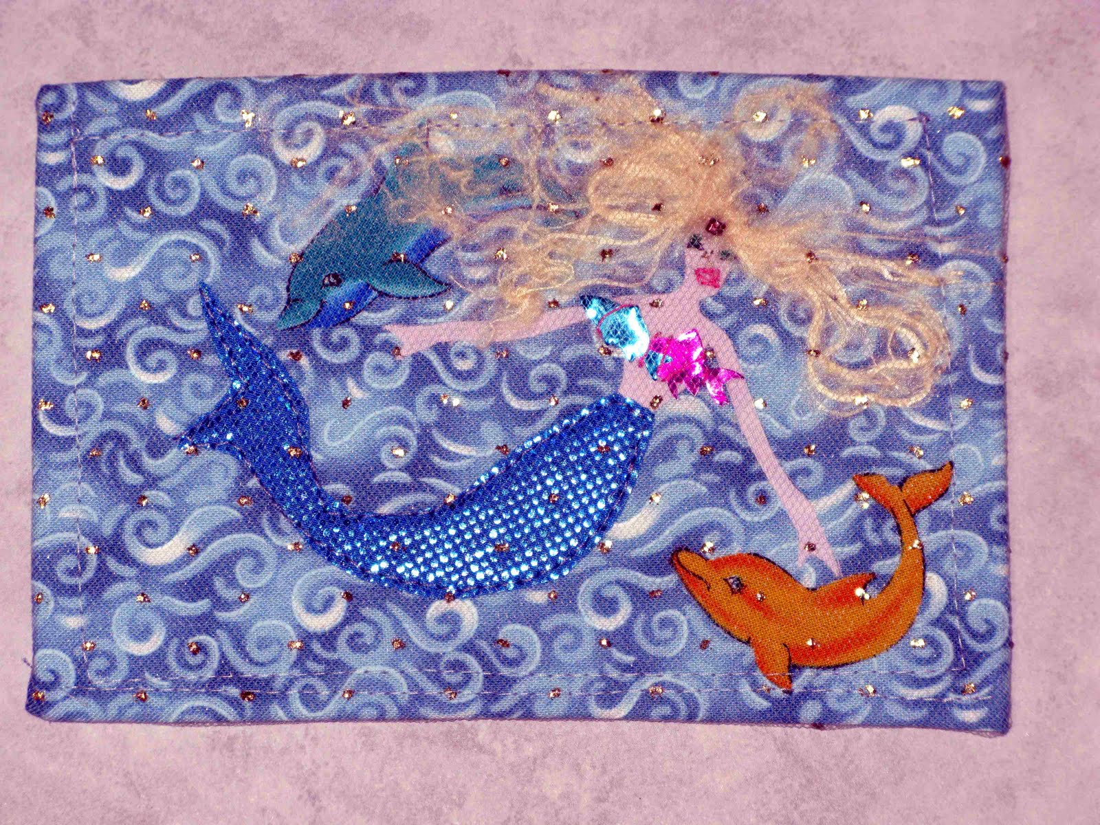 [mermaid+with+dolphins.jpg]
