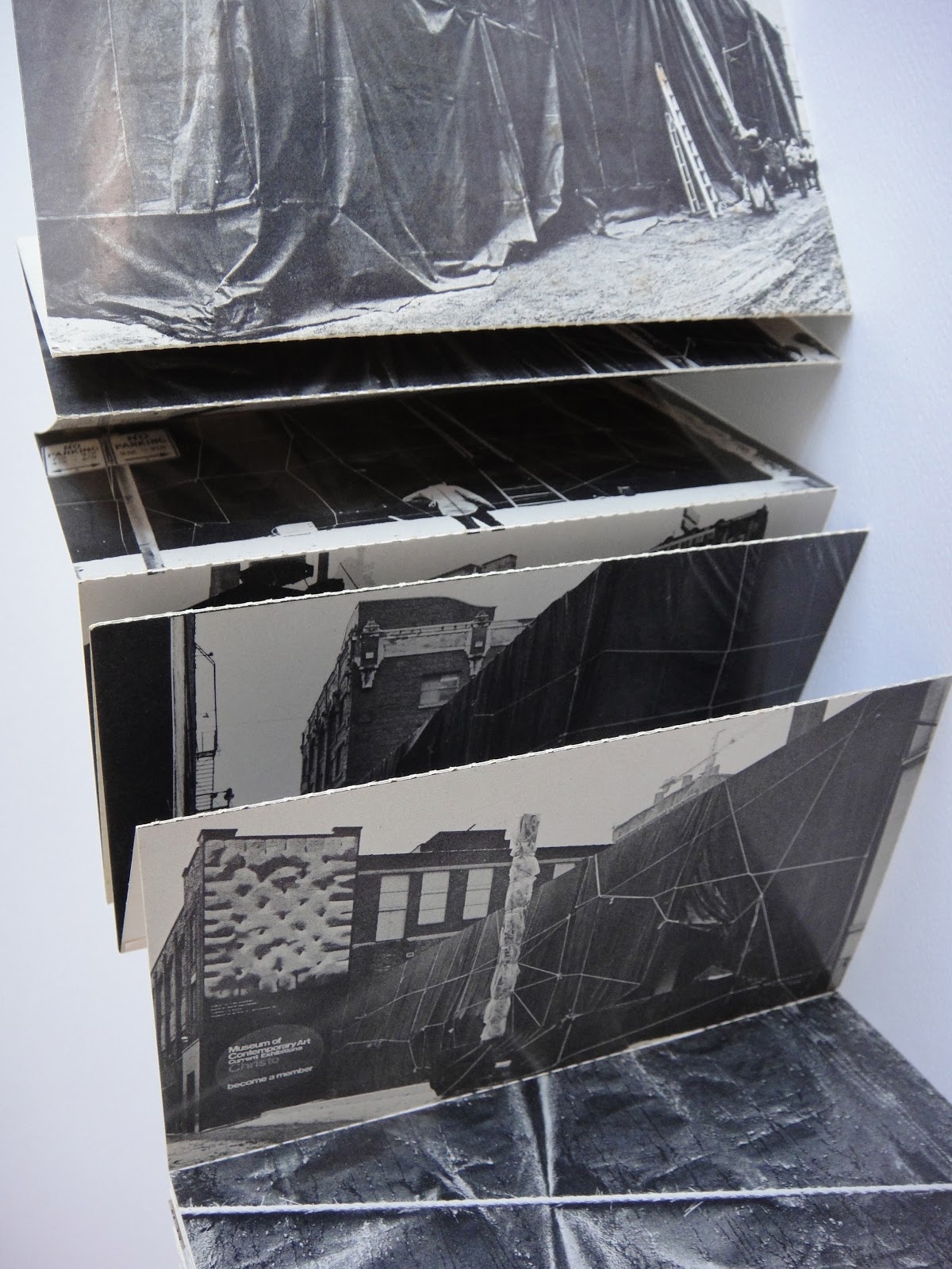 accordion publications Christo, Wrap In Wrap Out, perforated postcard