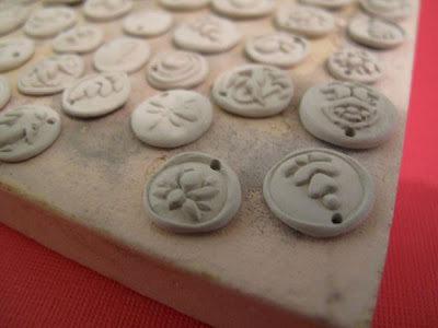 unfired silver metal clay charms Metal Clay Charms Waiting to be Fired