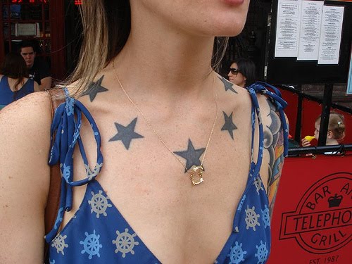 8. Star Tattoo Designs for Women's Arm - wide 2