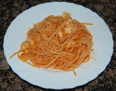 Spaghetti con sepia y tomate