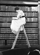 [woman_reading_on_top_of_ladder_1920.jpg]