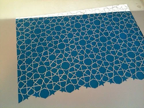 blue background and white stars paper cutting
