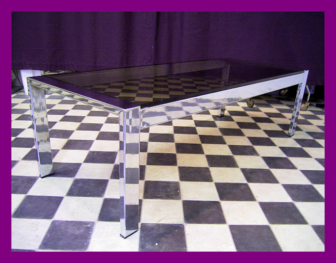 CHROMED COFFEE TABLE/ SMOKED GLASS - CIRCA 1970 - L: 120cm W: 47cm H: 36cm - PRICE: £100.00