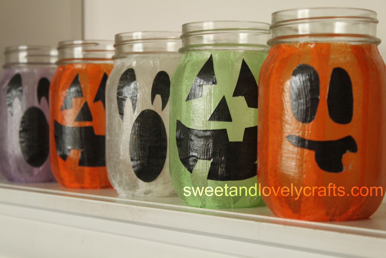 sweet and lovely crafts Pumpkin face jars