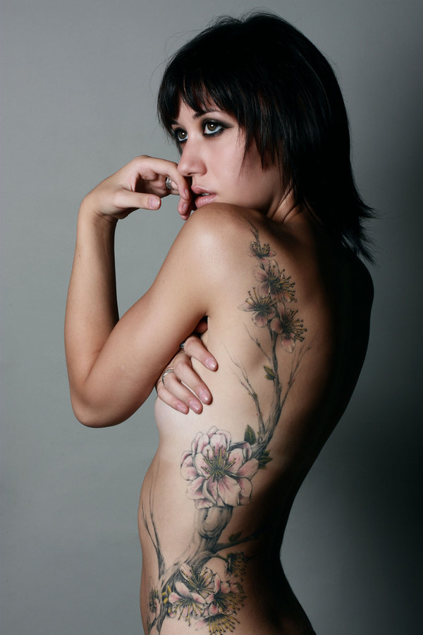 Women's whole body tattoo.