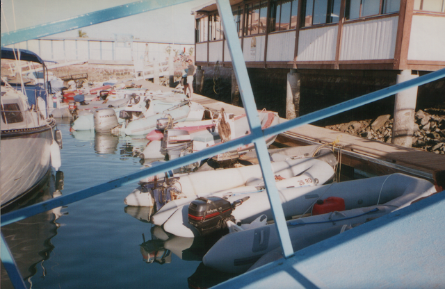 Inflatable dinghies lined up at dinghy dock in Mexico