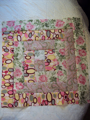 I love me some PINK Fabric making a log cabin quilt block,free pattern