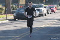 Luke May runs toward victory on the final straightaway of FSU's 2010 Race Judicata 5K.