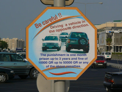 Qatari Road Sign: warning drivers not to go against the flow of traffic.