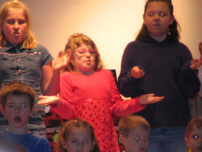 Kennedy singing with her grade four class - A Big Red Fella