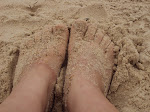 Com os pés n`areia