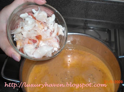 Succulent Lobster Tail in Yummy Bisque adding fresh lobster meat to bisque