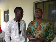THE ARTIST, MR LEON ASHAYE (L) AND THE CURATOR, MR EMMANUEL SILVA AT THE OPENING CEREMONY