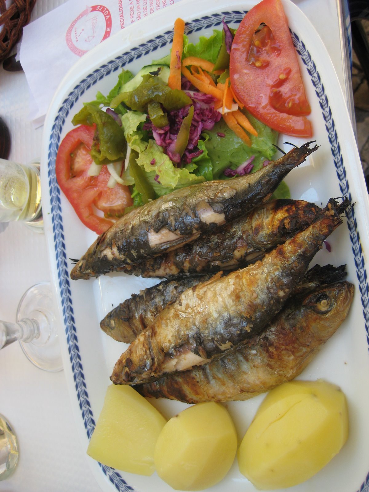 Eating sardines in Lisbon — mmmmm!