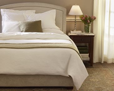 Upholstered bed with nail head trim from Pottery Barn