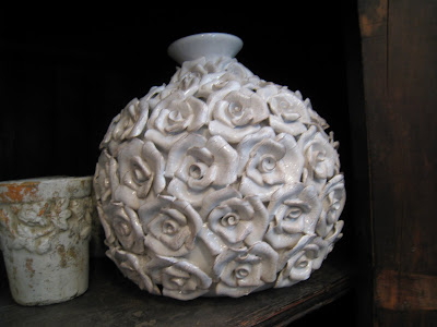 White ceramic flower relief ceramic bud vase from The Empty Vase