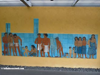 Mural about ancient Hawaiian life at park entrance